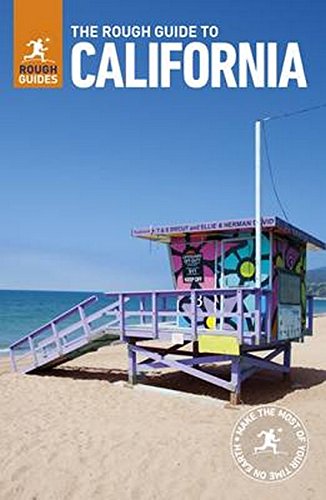 "Travel guide book cover featuring a colorful beach lifeguard tower on a sandy shore."