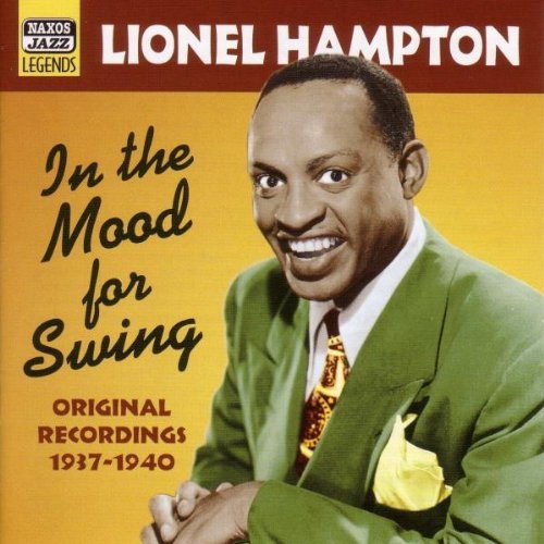 Lionel Hampton album cover with a man in a green suit against a yellow background.