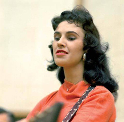 Wanda Jackson's vinyl album cover featuring a close-up of her in a red top.