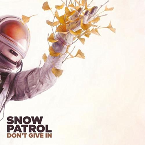 Vinyl album cover with astronaut holding yellow leaves, Snow Patrol text at bottom.