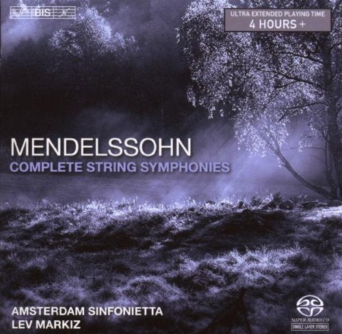 "Mist-covered landscape with trees, white text, and logos on a CD cover."