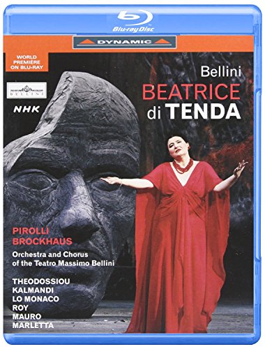 Blu-ray case with a woman in a red dress standing next to a stone head.