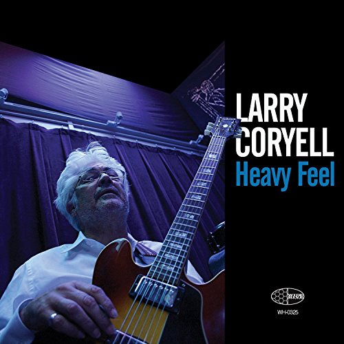 Album cover with Larry Coryell holding a guitar, titled "Heavy Feel".