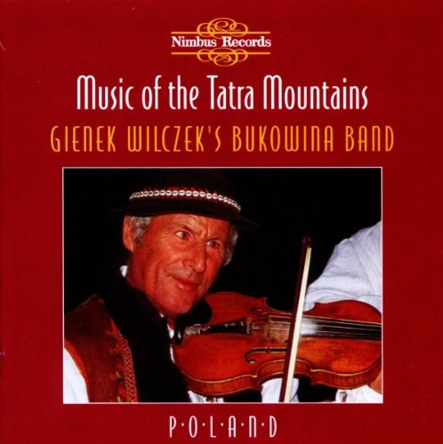 "Red album cover with a man holding a violin, wearing a hat."