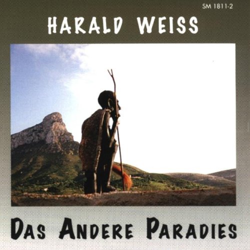 "CD cover with a statue and mountain landscape, titled 'Das Andere Paradies' by Harald Weiss."