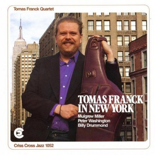 "CD cover with a man holding a double bass in front of New York buildings."