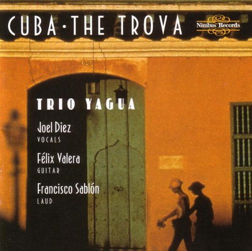 "CD cover with orange building, arched doorway, and silhouetted figures walking."