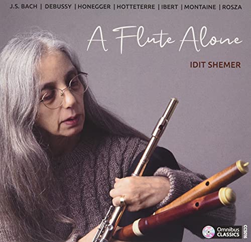 Woman with long gray hair holding multiple flutes, album cover titled "A Flute Alone".