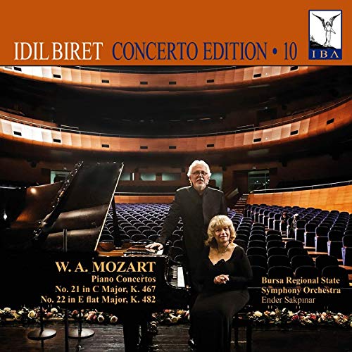 CD cover with a man and woman in a concert hall.
