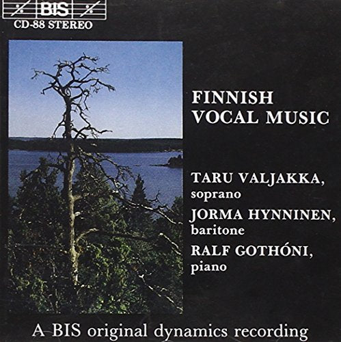 A CD cover with a bare tree by a lake, on a black background.