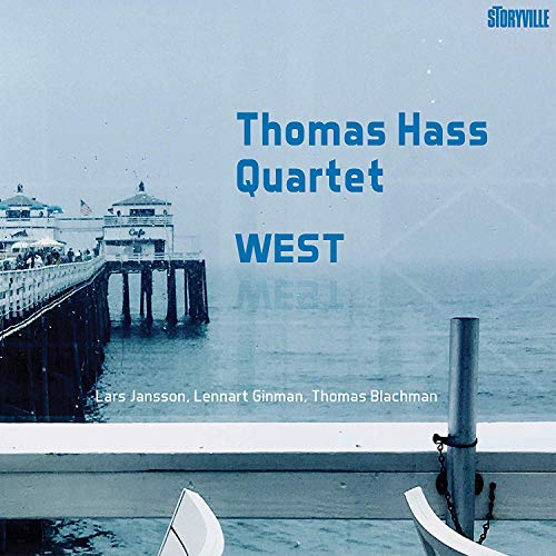 "CD cover featuring a foggy pier scene with blue text and artist names."
