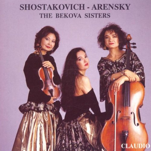 Three women in formal dresses holding stringed instruments on a purple background.
