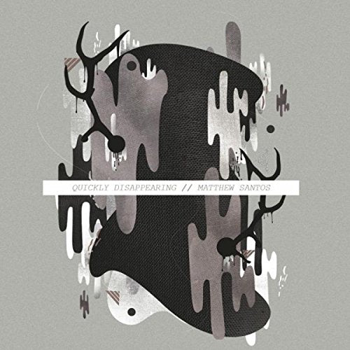 "Album cover with abstract black and white shapes on a gray background."