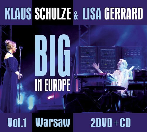 DVD cover featuring a man and woman performing on stage with musical equipment.