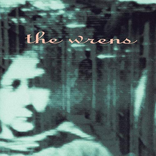 "Blurry album cover with 'the wrens' in orange text on a dark background."