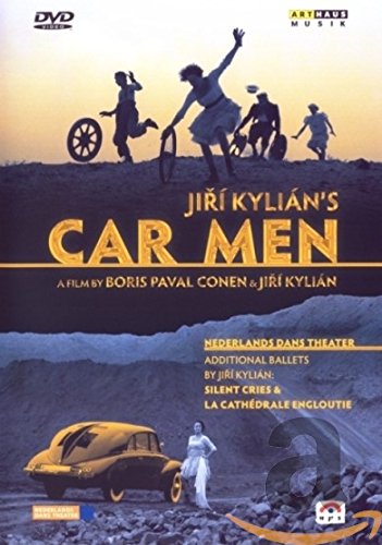 DVD cover featuring dancers and a car on a rocky landscape.