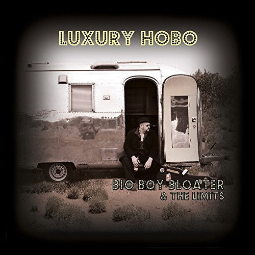 Vinyl album cover featuring a man sitting outside a camper trailer.