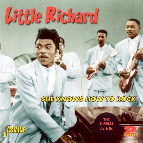 "Album cover featuring Little Richard playing piano with band, light blue suits, red and yellow text."