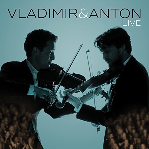 "CD cover featuring two men in suits playing violins together on stage."
