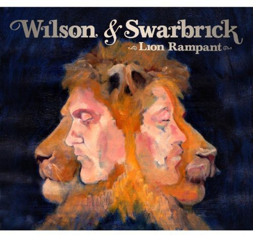 Album cover featuring a man's face merged with a lion's head on a dark background.