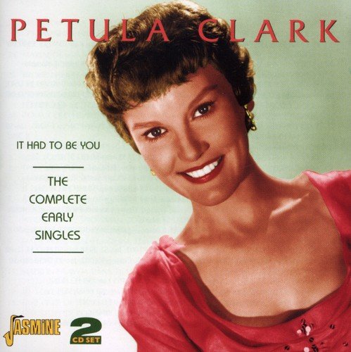 CD cover featuring Petula Clark smiling, wearing a pink dress, against a green background.