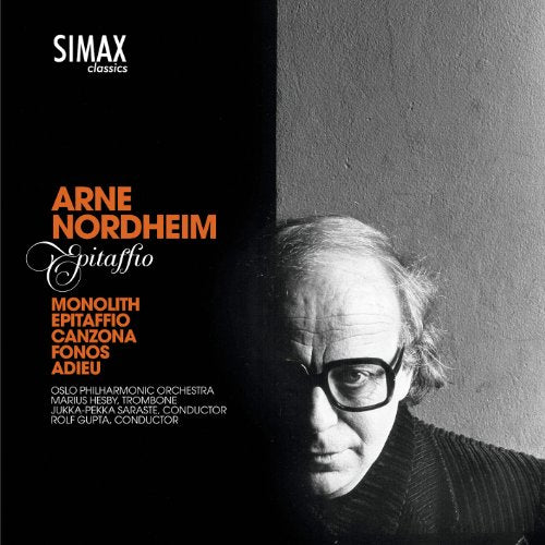 "Album cover with black and white photo of man and orange text on black background."