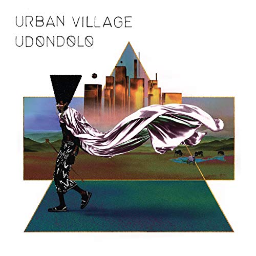 The image depicts a CD cover featuring a person with a flowing cloak. For accessibility purposes, a suitable alt text could be: "CD cover with person in shiny attire and flowing cloak."