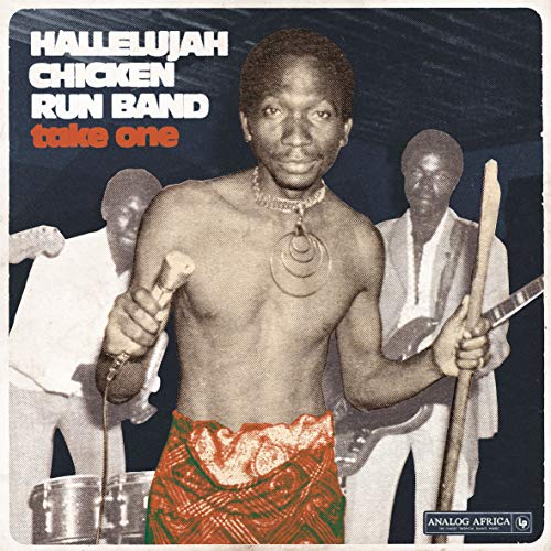 "Album cover with a man holding drumsticks and two musicians in the background."