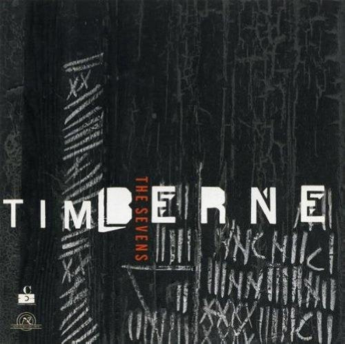 "Album cover for 'The Sevens' by Tim Berne, featuring a black background with white markings."