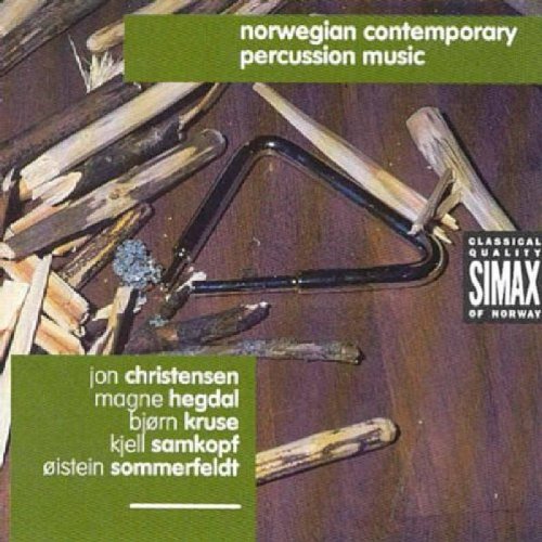 "CD cover with percussion instruments and text on a wooden background."