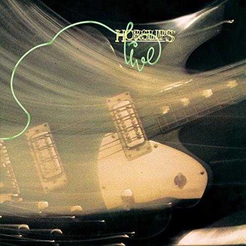 "Album cover featuring a blurred guitar with 'Horslips Live' text in yellow and green."
