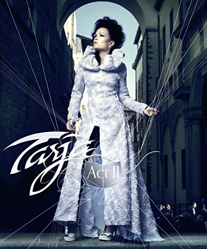 The image depicts a woman in a long, white dress with marionette strings attached.