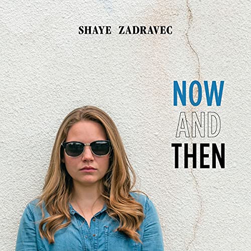 "Album cover featuring a woman in sunglasses against a cracked white wall background."