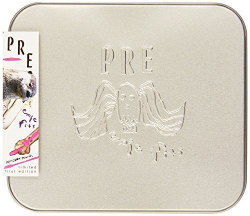 A beige metal case with embossed "PRE" and owl design, accompanied by a label.