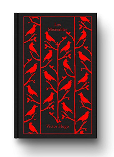 "Black hardcover book with red birds on branches and title 'Les Misérables' on the cover."