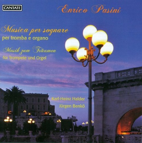 "CD cover featuring a serene nighttime cityscape with a lit streetlamp and archway."