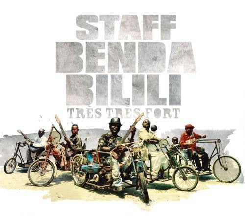 Album cover with men on bicycles and motorcycles, holding guns, in a desert landscape.