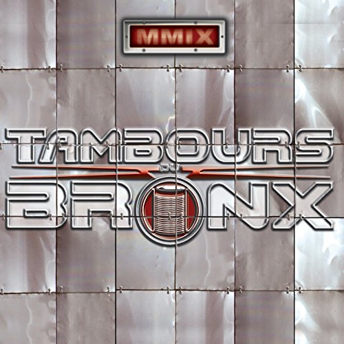 "Album cover with 'TAMBOURS DU BRONX' text, drum image, on metallic silver background."