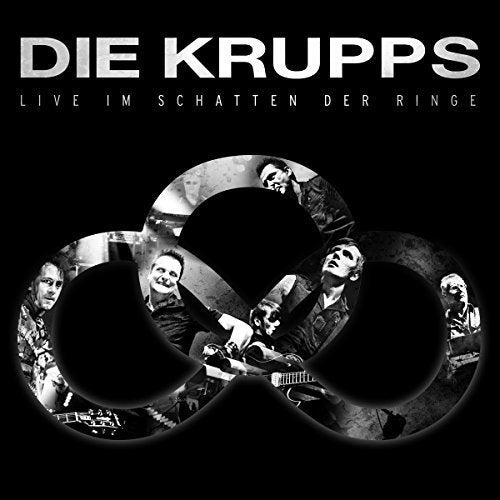 "CD cover with black background, band members in a ring, and silver text 'DIE KRUPPS'."