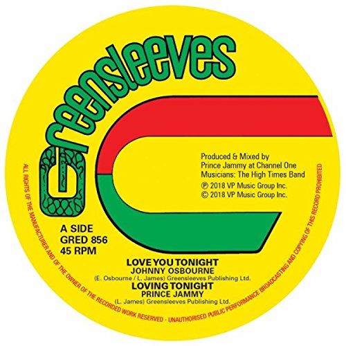 Yellow vinyl record label with green, red, and black text and graphics.