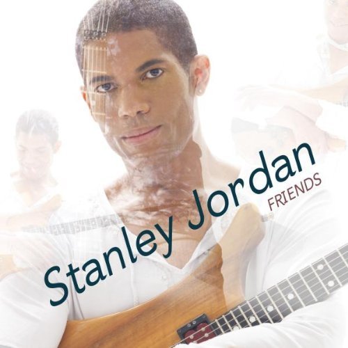 Stanley Jordan album cover with a man holding a guitar, featuring artist and album names.