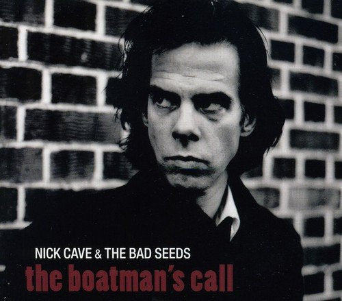 "Album cover with black and white photo of Nick Cave against a brick wall."
