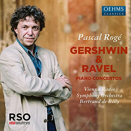 CD cover with a man in a beige jacket and blue shirt.