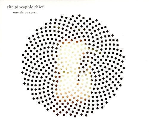 The image is a CD cover with a white background and a circular pattern of dots. For accessibility purposes, a suitable alt text could be: "CD cover with gradient dots forming a circle on a white background."