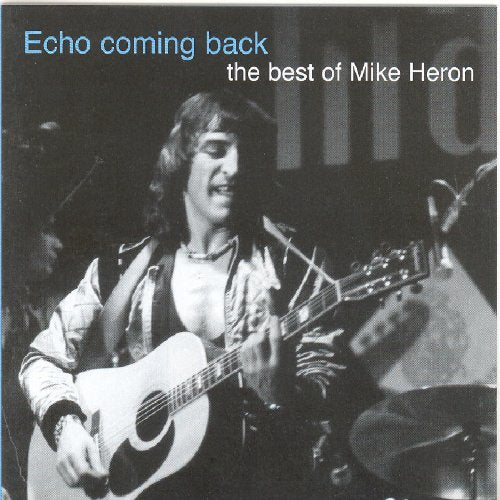Album cover featuring black-and-white photo of man playing guitar on stage.