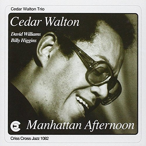 Cedar Walton's album cover, sepia-toned, featuring a man with a trumpet mouthpiece.