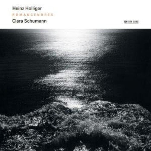 "Album cover with black and white water image and artist names at the top."