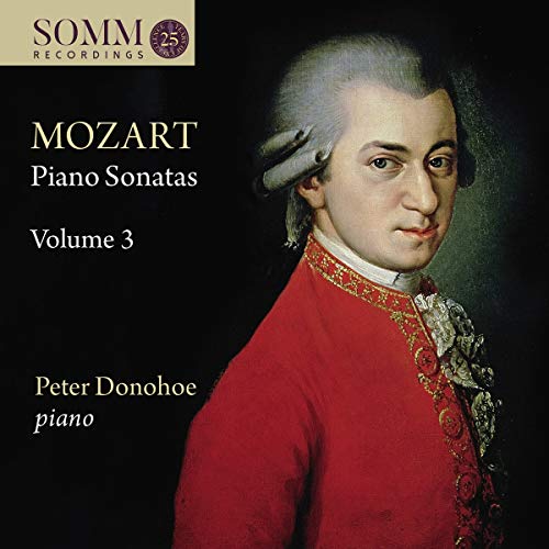 CD cover featuring portrait of Mozart in red coat against a black background.