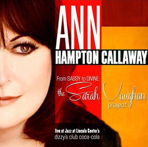 CD album cover with a woman's face and red and orange background.