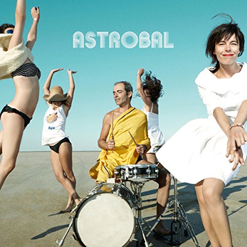 Album cover featuring a man drumming on a beach with four dancing women.